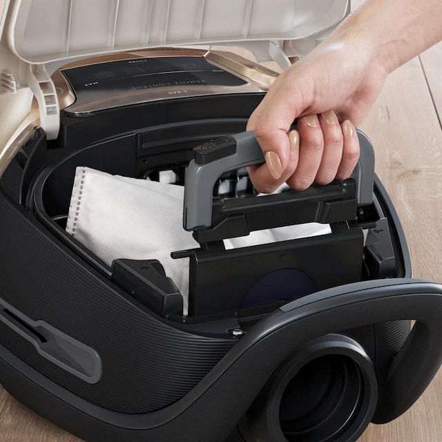 Hygenisk bytte av støvsugerpose